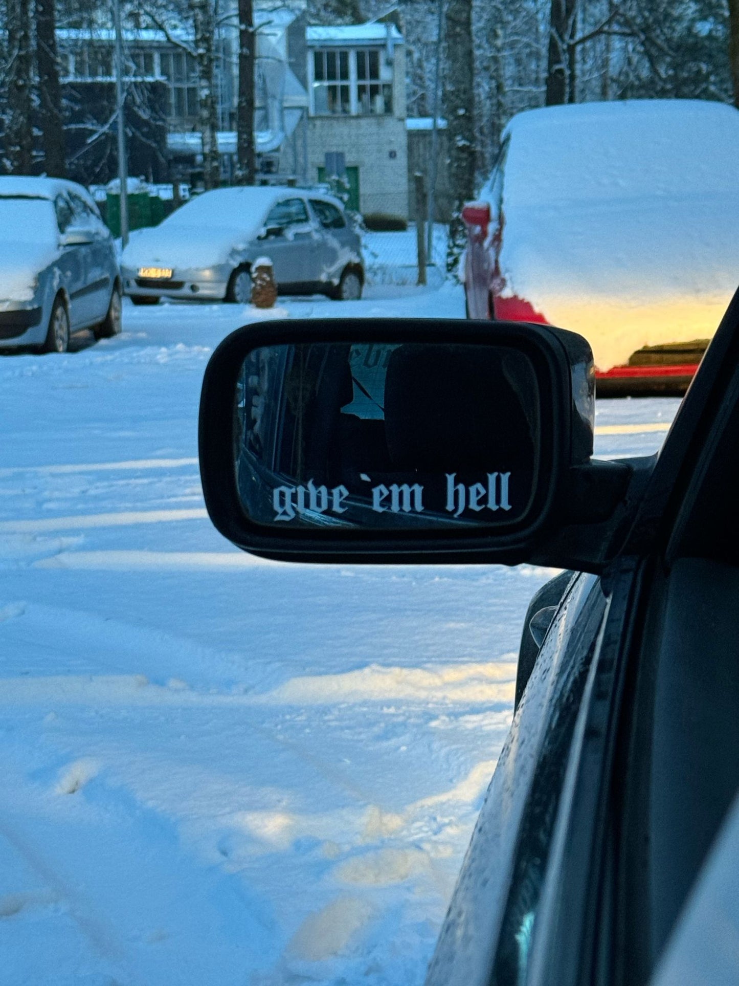 ''Give `em hell'' Mirror Sticker