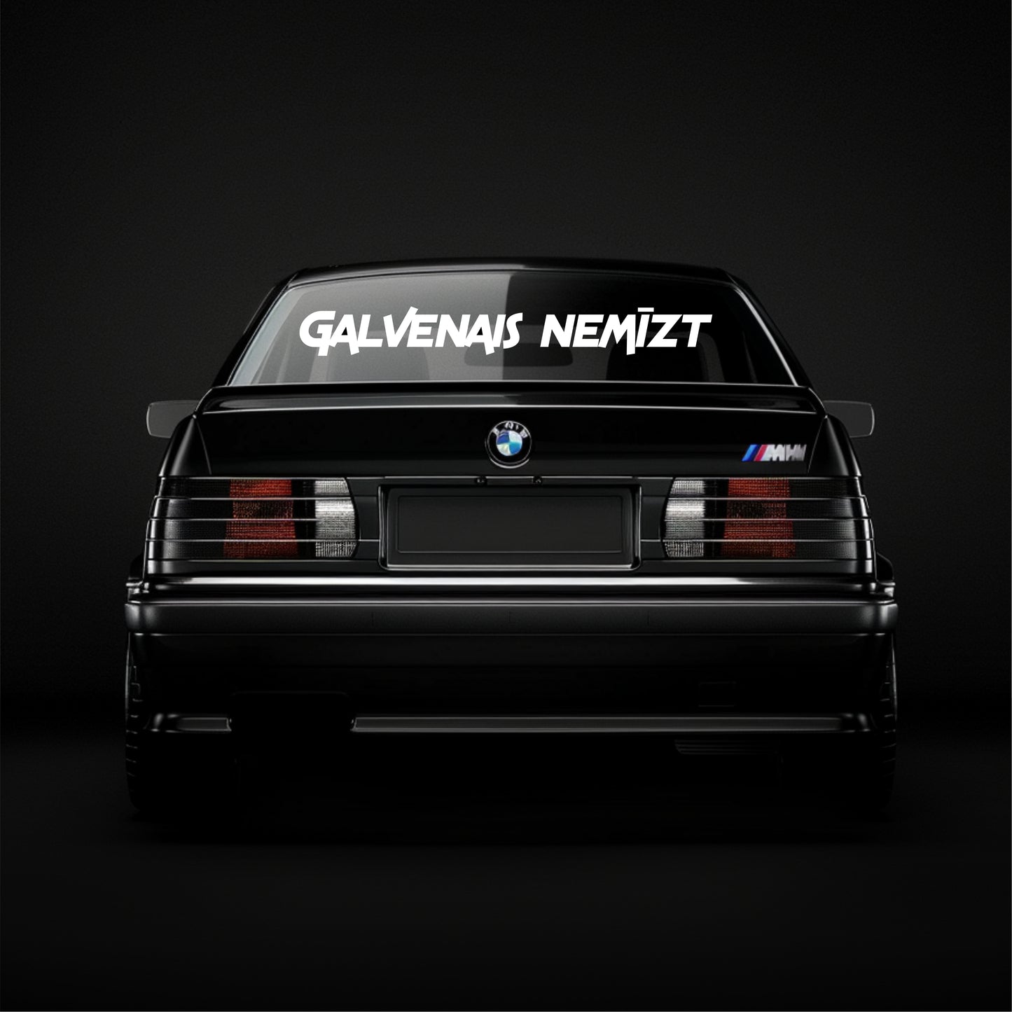 BMW car with 'Galvenás Nemízt' text on the windshield against a black background