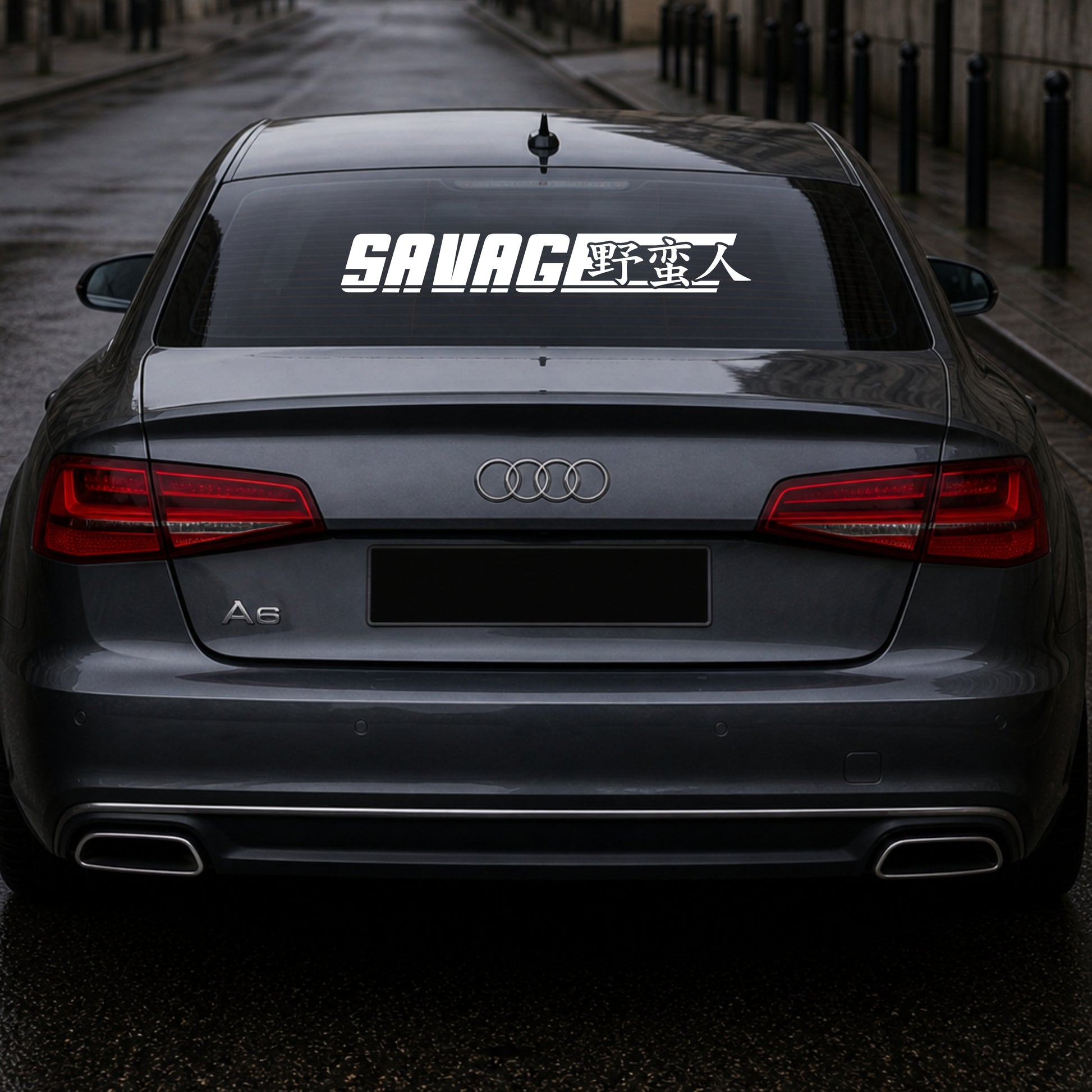 Audi car with 'SAVAGE' decal on the back window