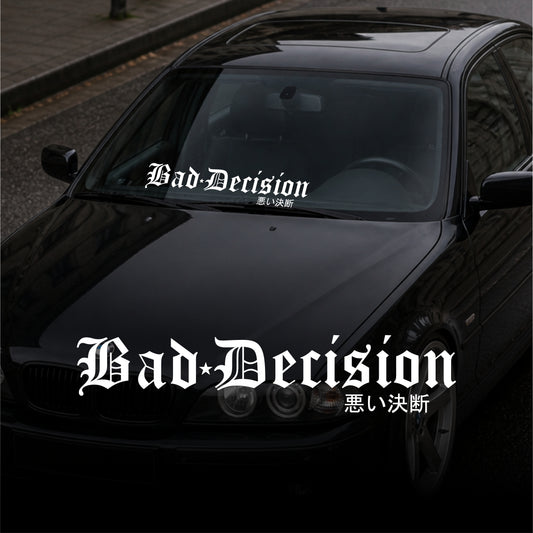 Black car with 'Bad Decision' decal on windshield and hood