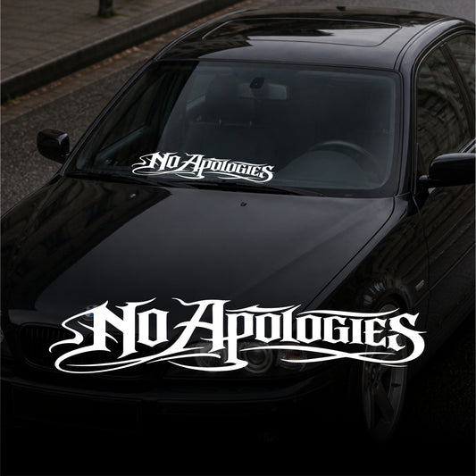 Black car with 'No Apologies' decal on a street