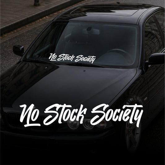 Black car with 'No Stock Society' decal on a street