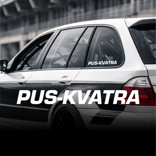 Car with 'PUS-KVATRA' decal on a blurred background