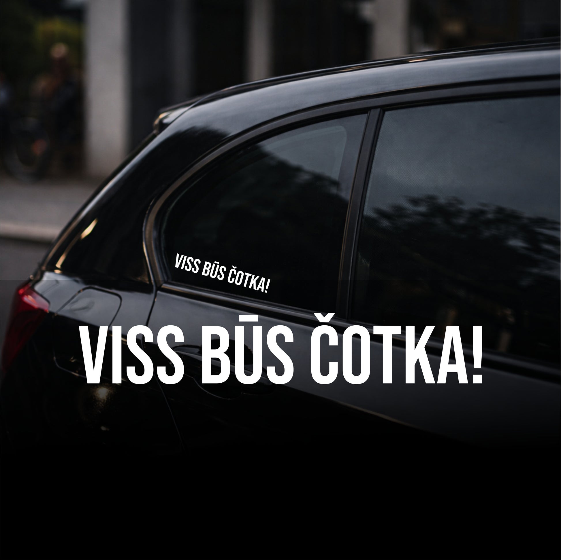 Car window with a decal reading 'VISS B×œ ńOTKA!' on a dark background