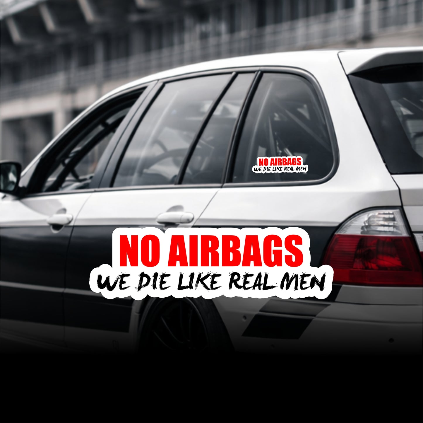 Car with humorous 'No Airbags' decal on a blurred background