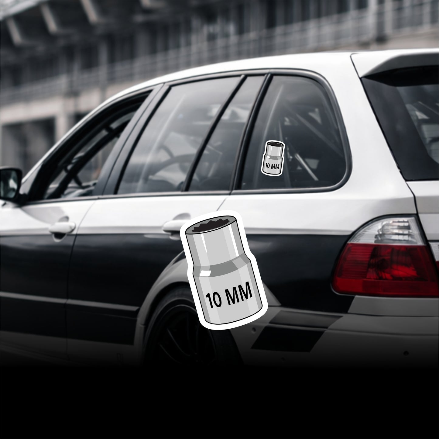 Car with a 10 mm socket tool decal on the window