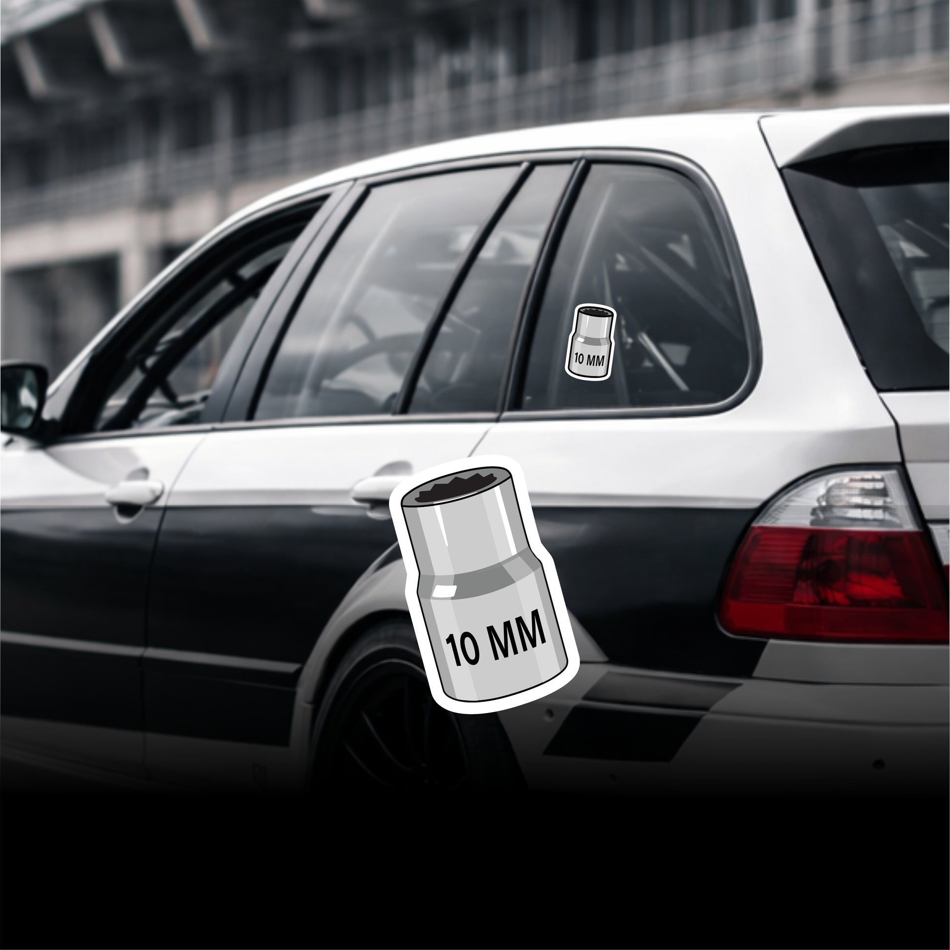 Car with a 10 mm socket tool decal on the window