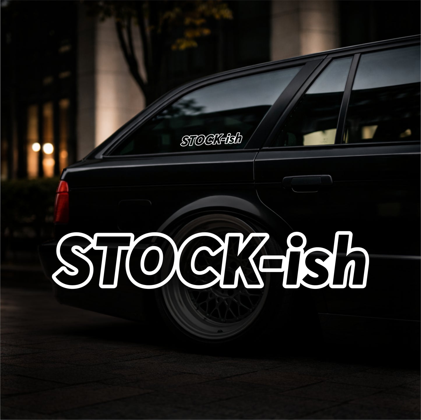 Black car with 'STOCK-ish' decal on a dark background