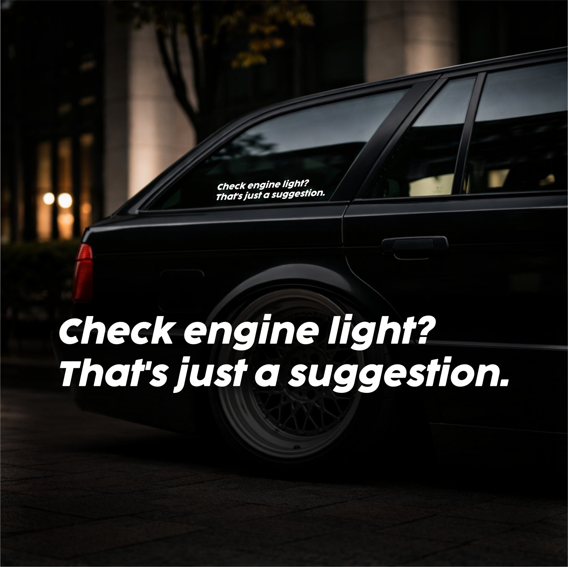 Car with a humorous check engine light sticker on a dark background