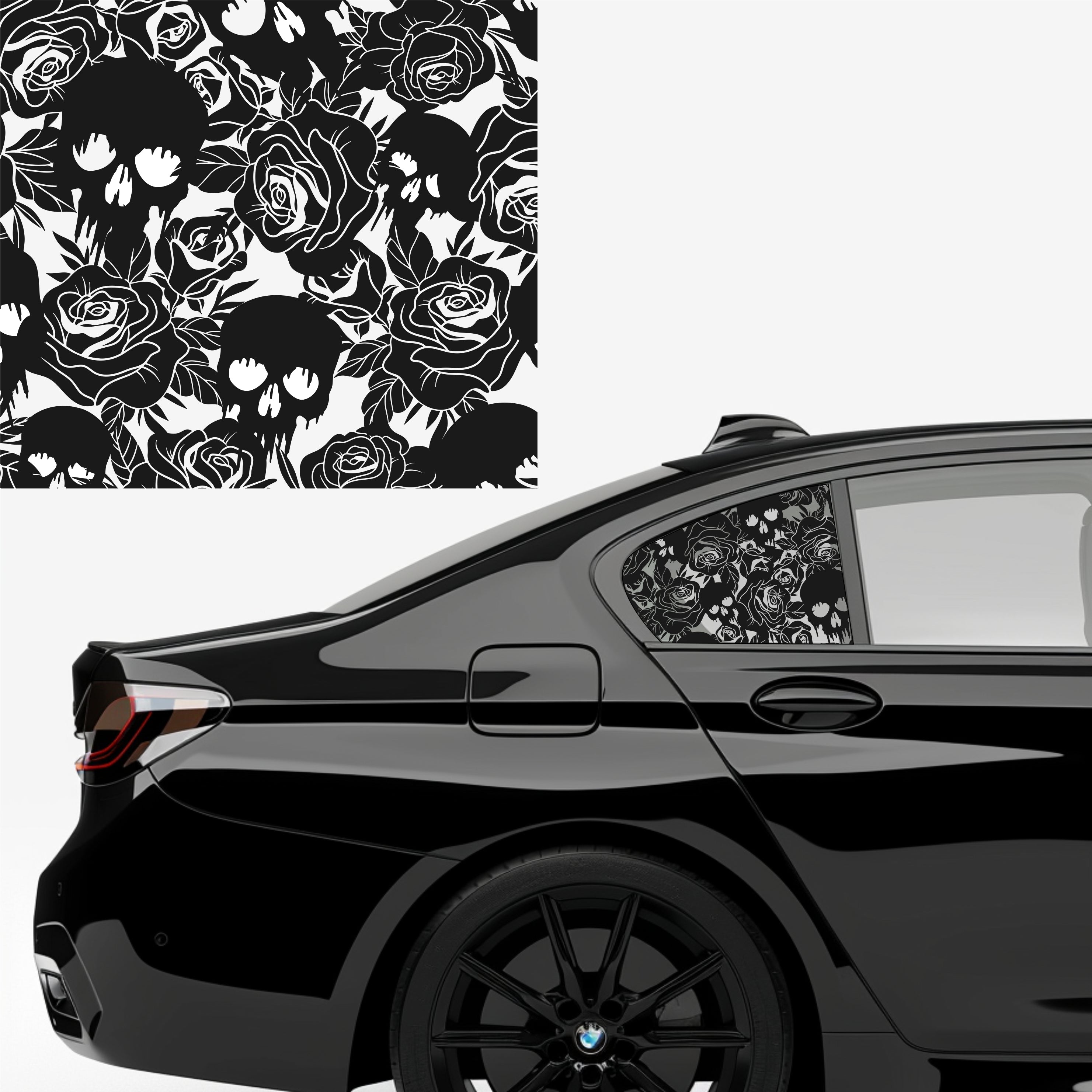 Black car with floral design on a white background