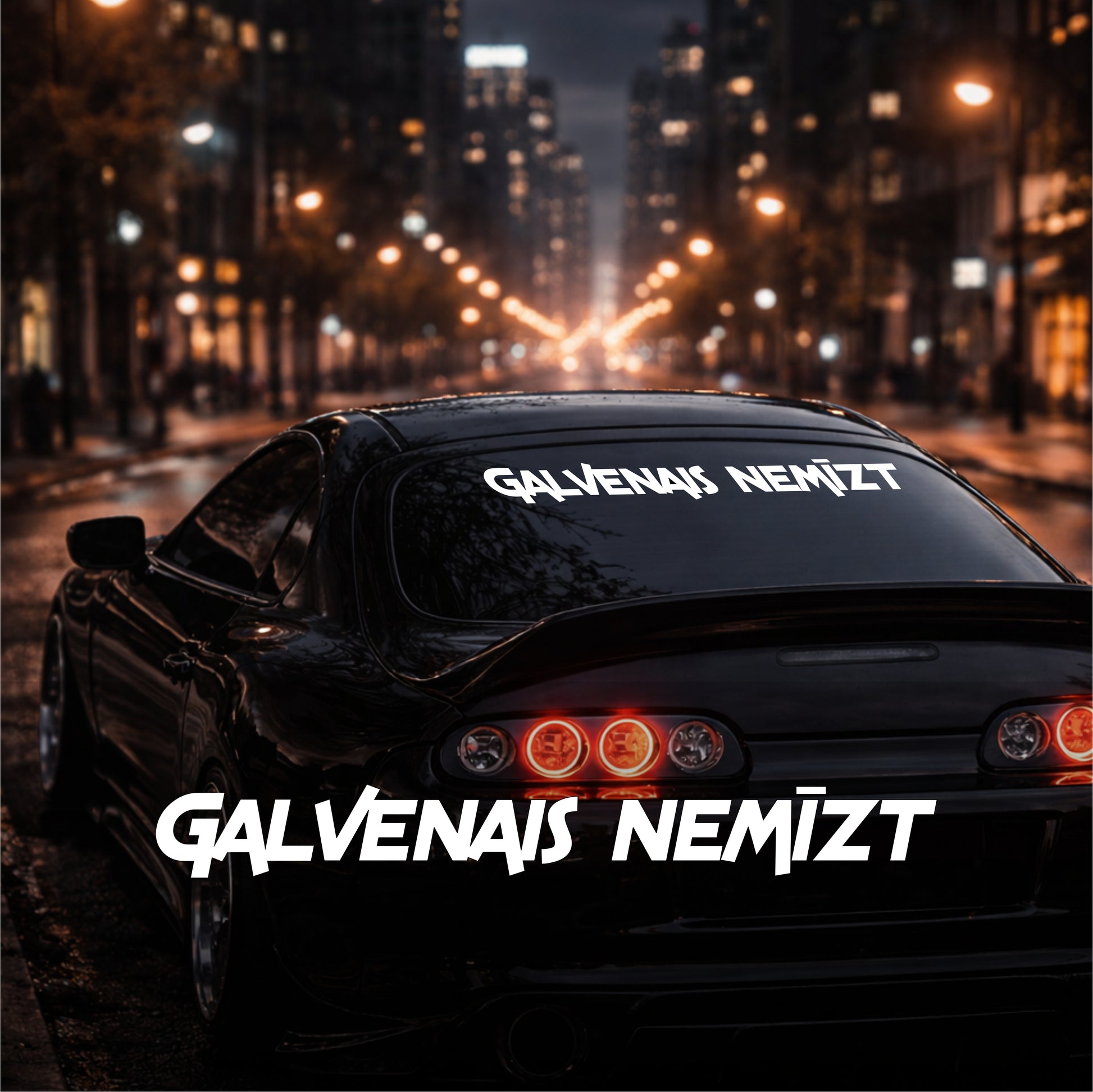 Car with 'Galvenais Nemizt' on a city street at night