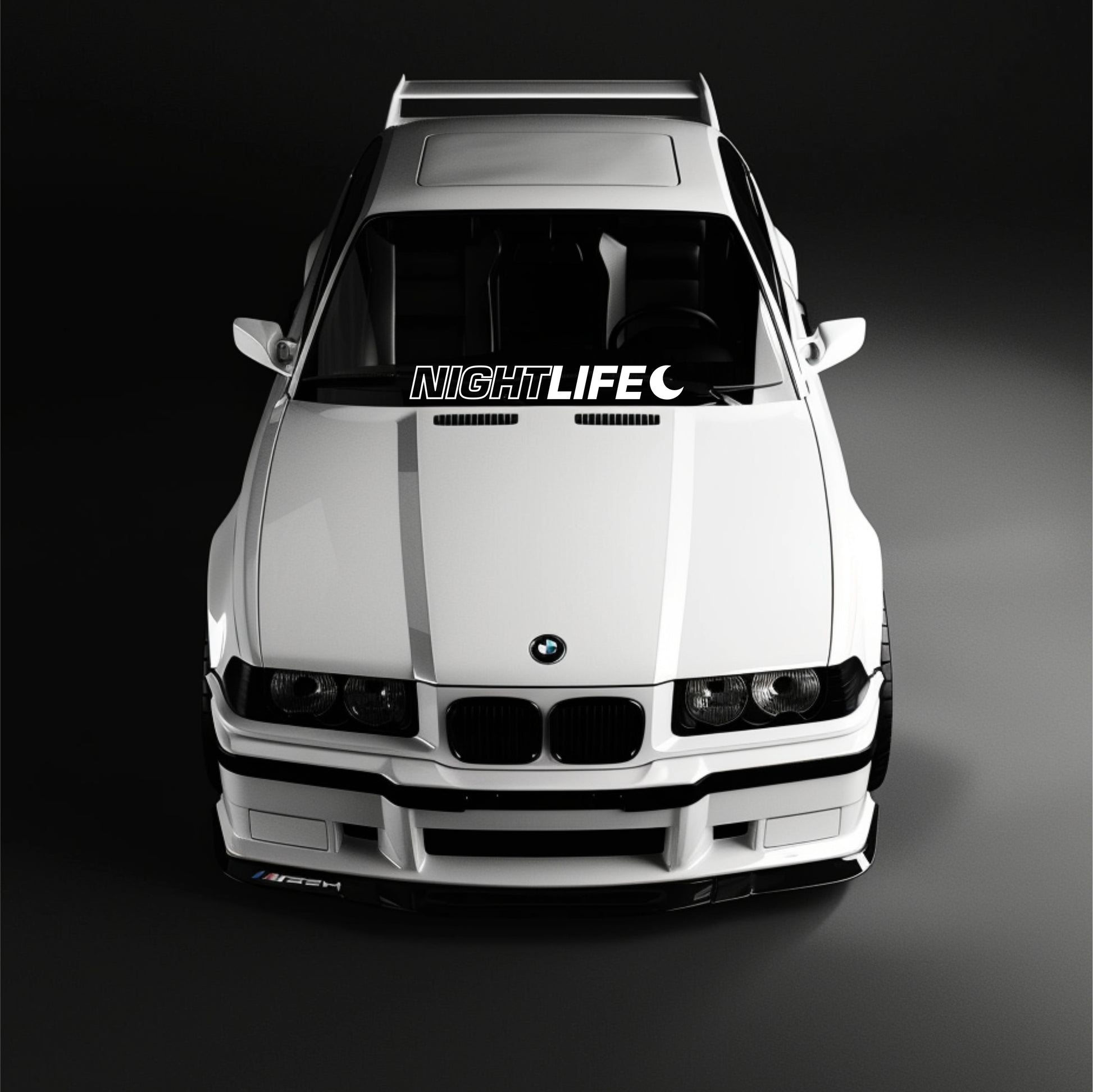 White BMW car with 'NIGHTLIFE' decal on a black background