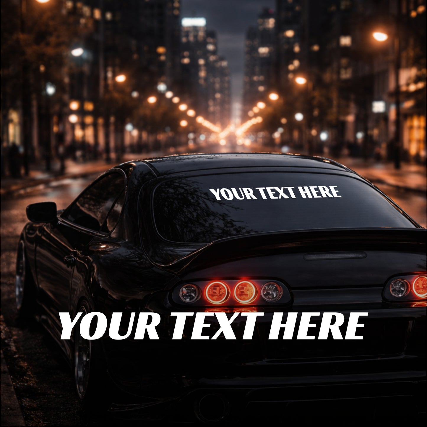 Car with customizable text on a city street at night