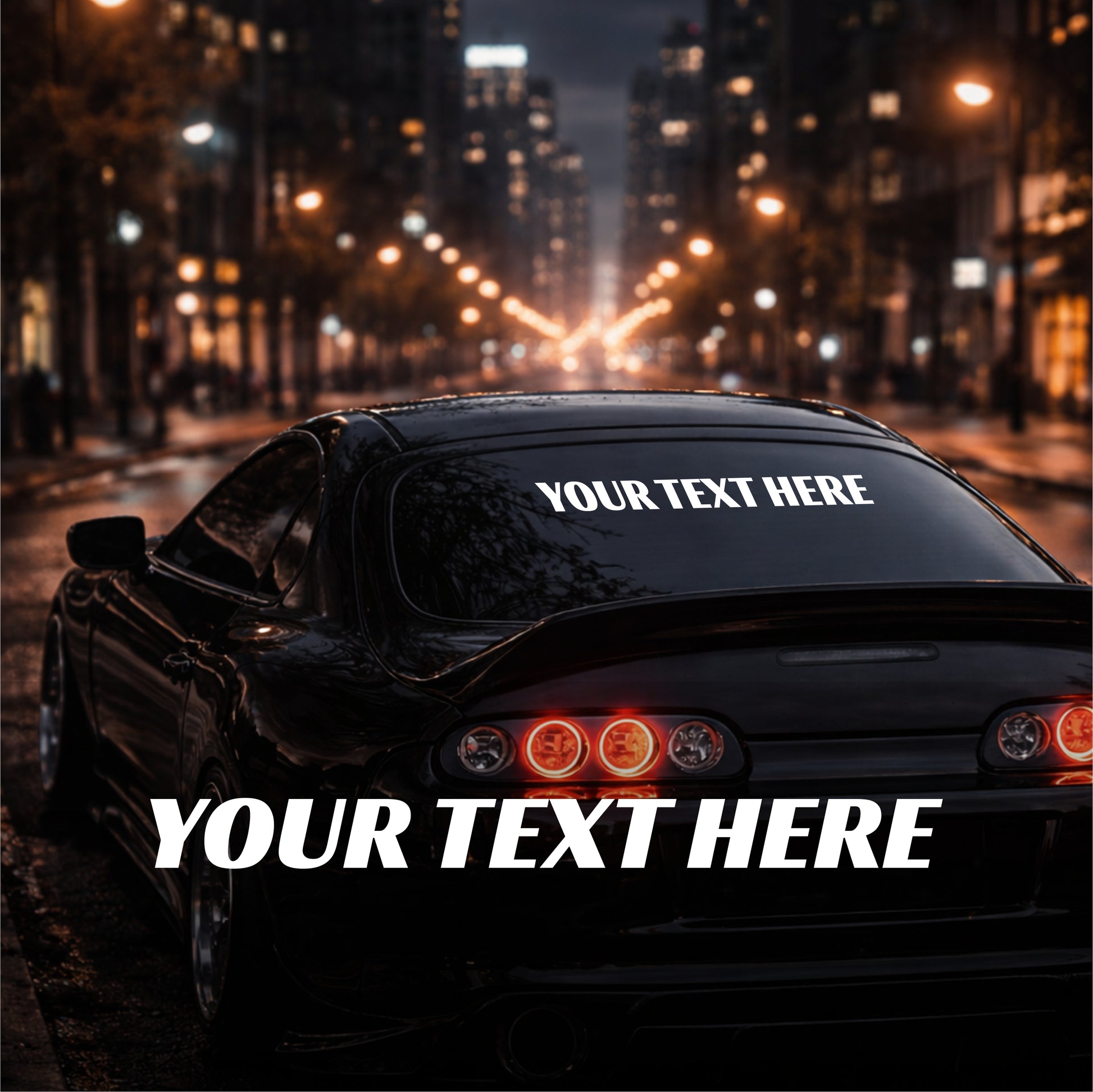 Car with customizable text on a city street at night