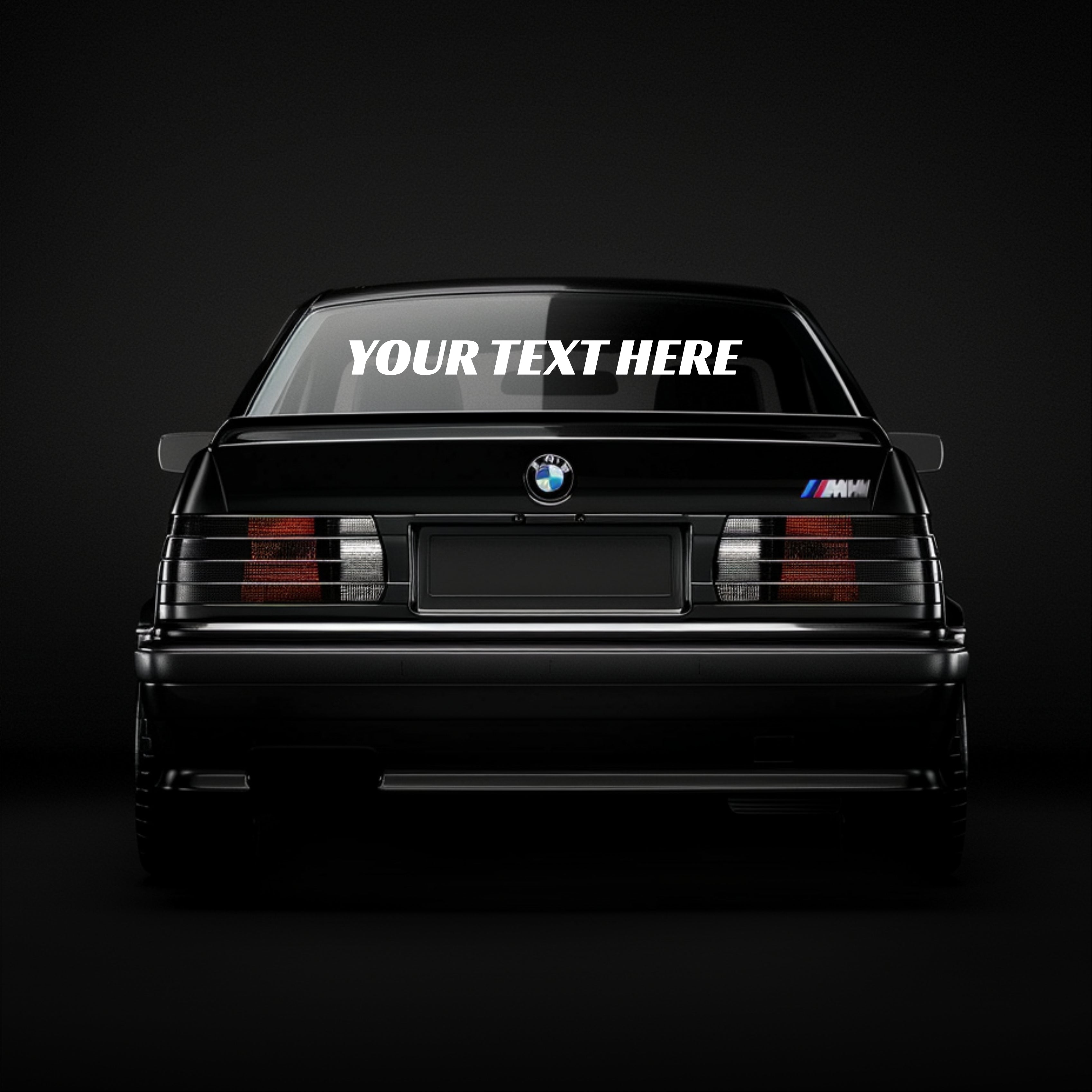 Black BMW car with customizable text on a dark background