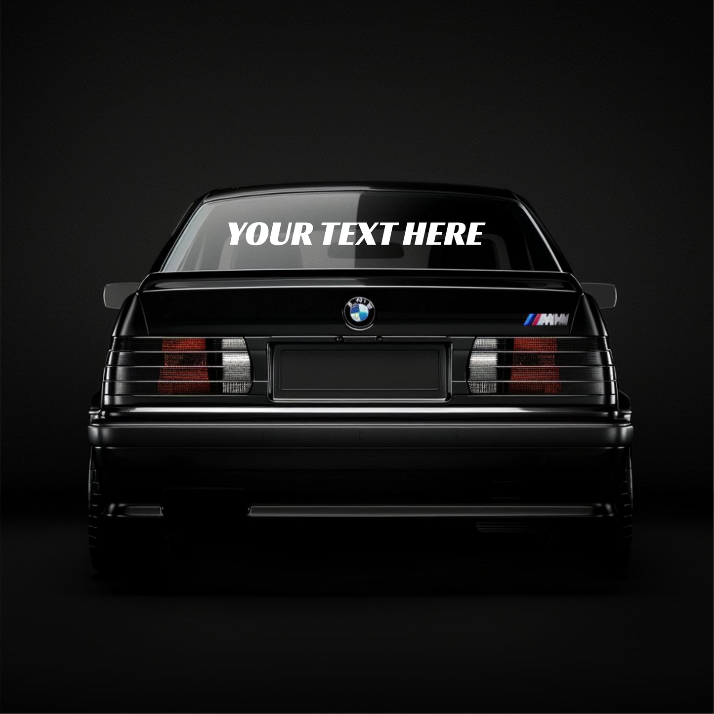 Black BMW car with customizable text on a dark background
