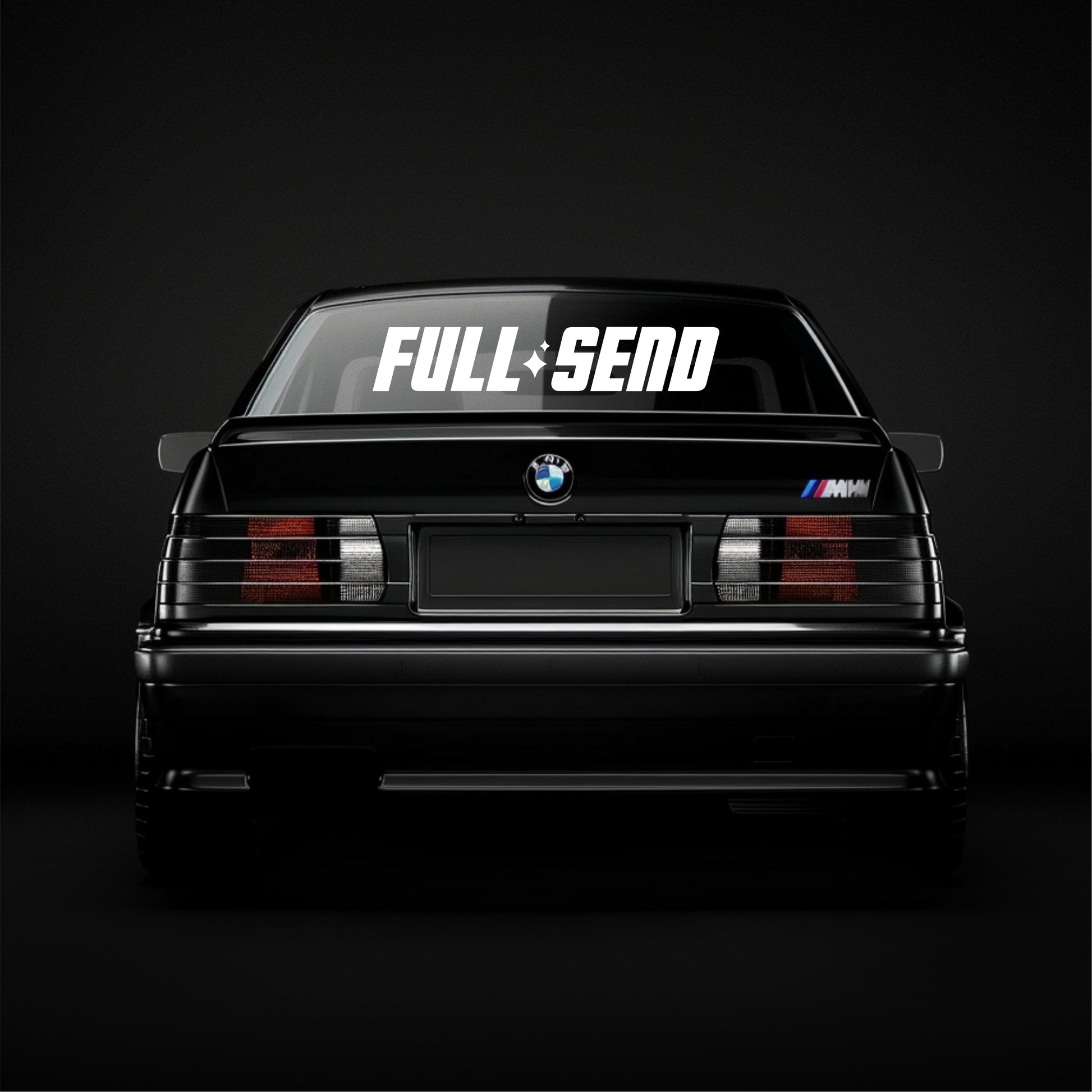 BMW car with 'FULL SEND' decal on a black background