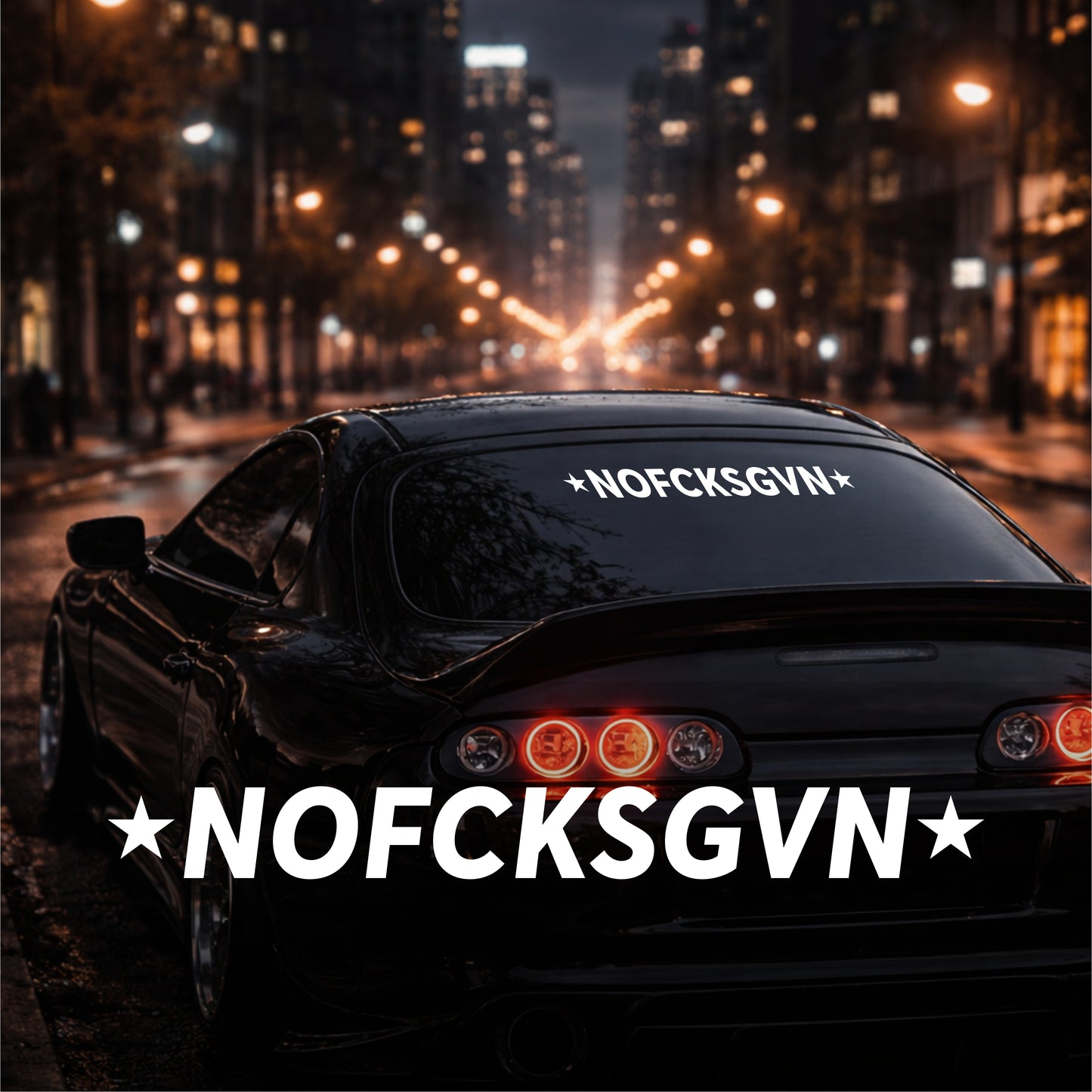Car with 'NOFCKSGVN' text on a city street at night