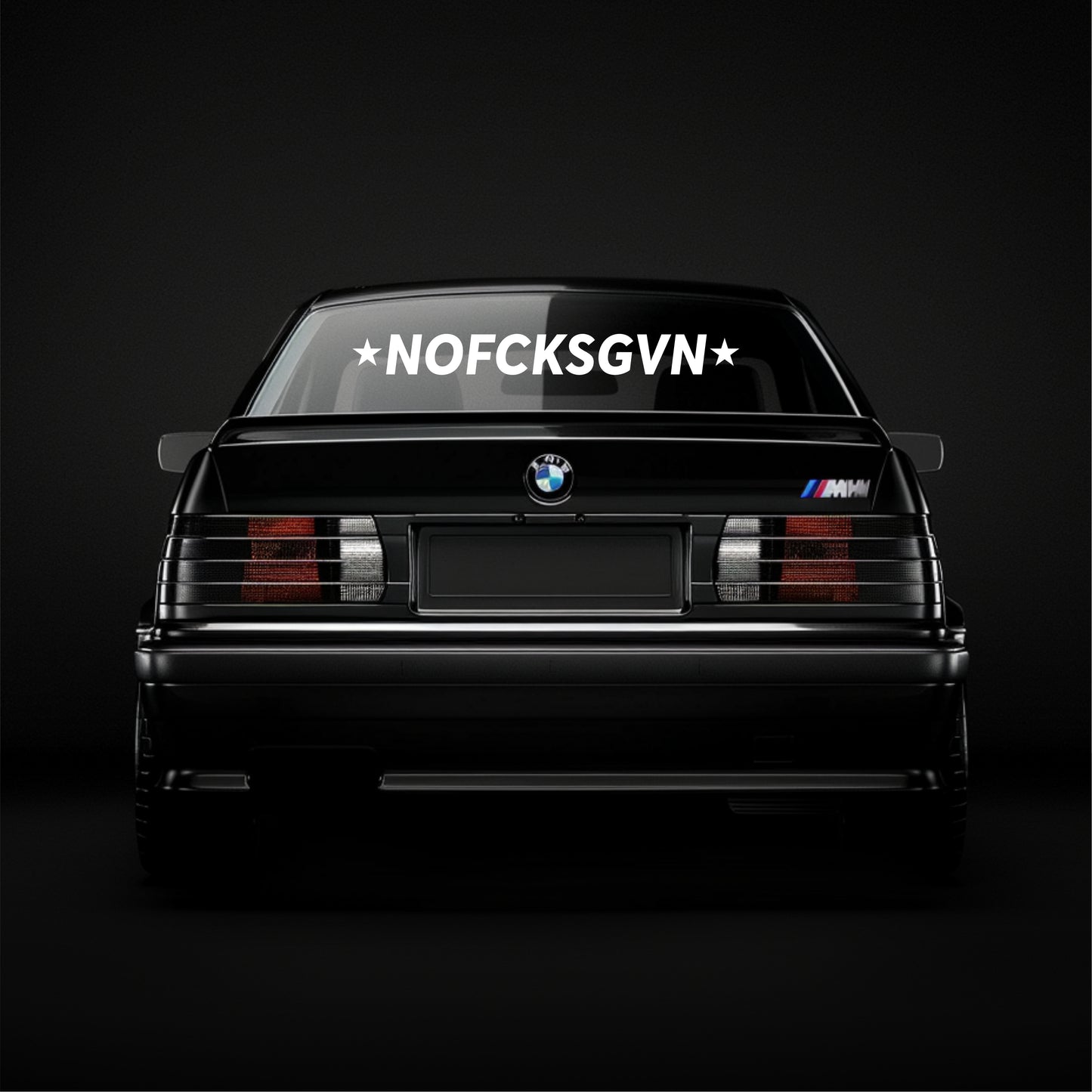 BMW car with a personalized license plate on a black background