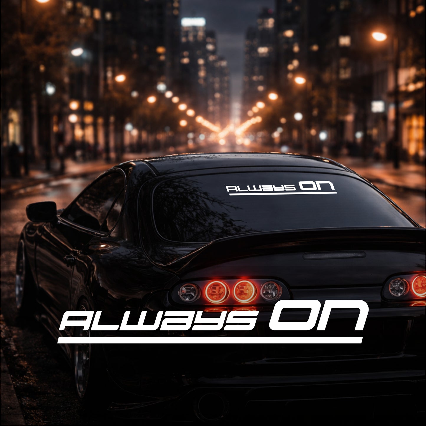Car with 'Always On' branding on a city street at night
