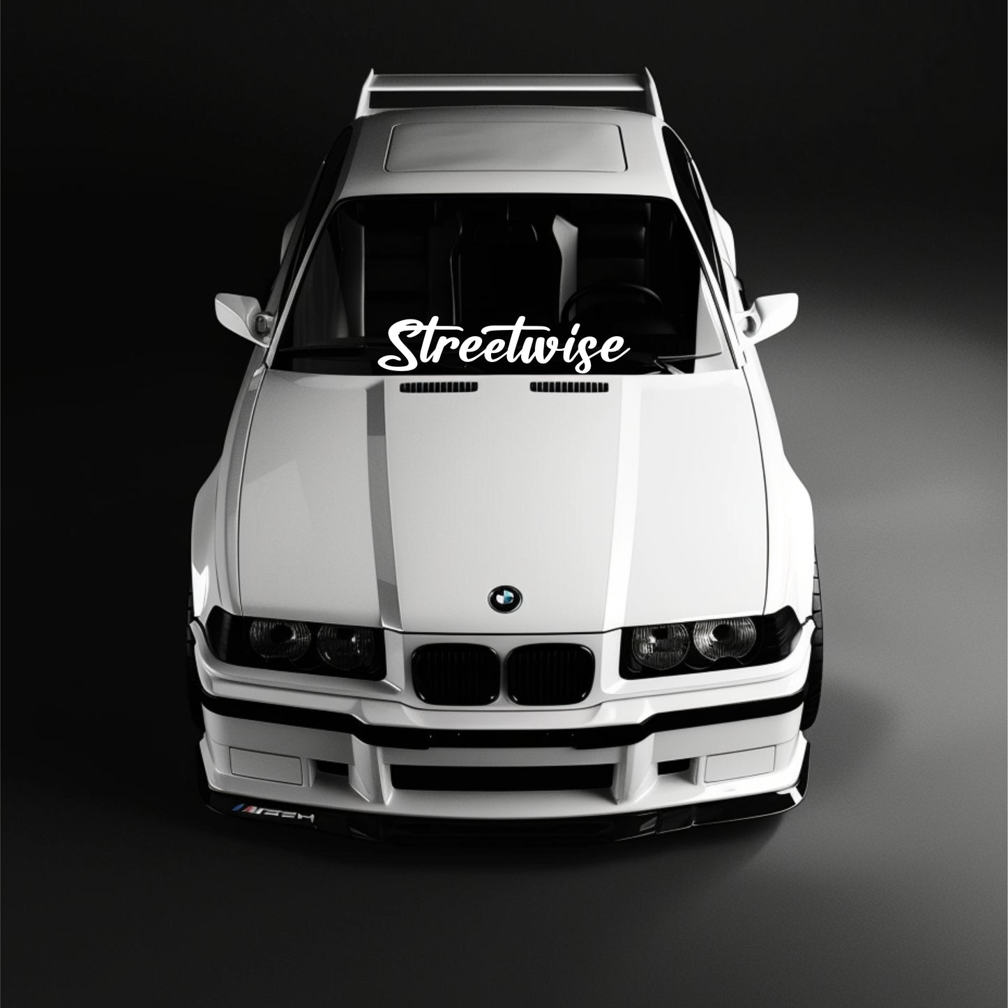 White BMW with 'Streetwise' decal on a black background
