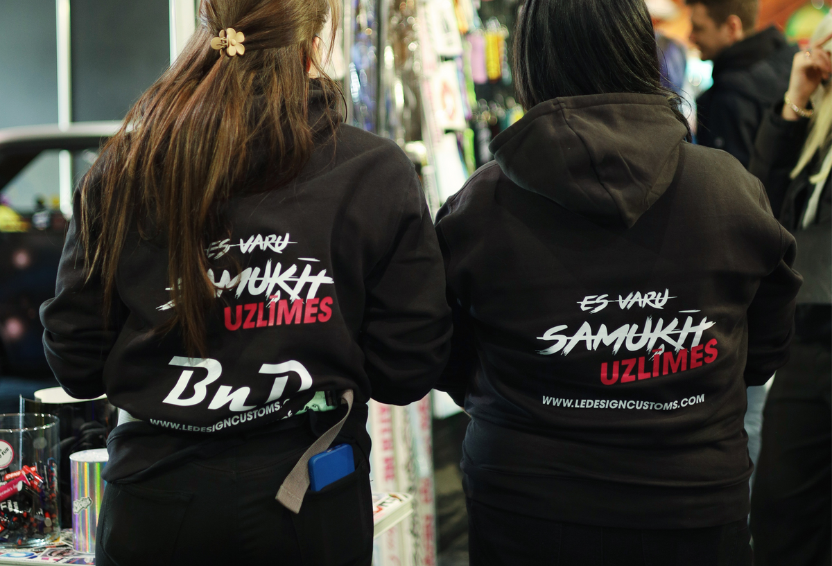 Le Design Customs brand team wearing black hoodies