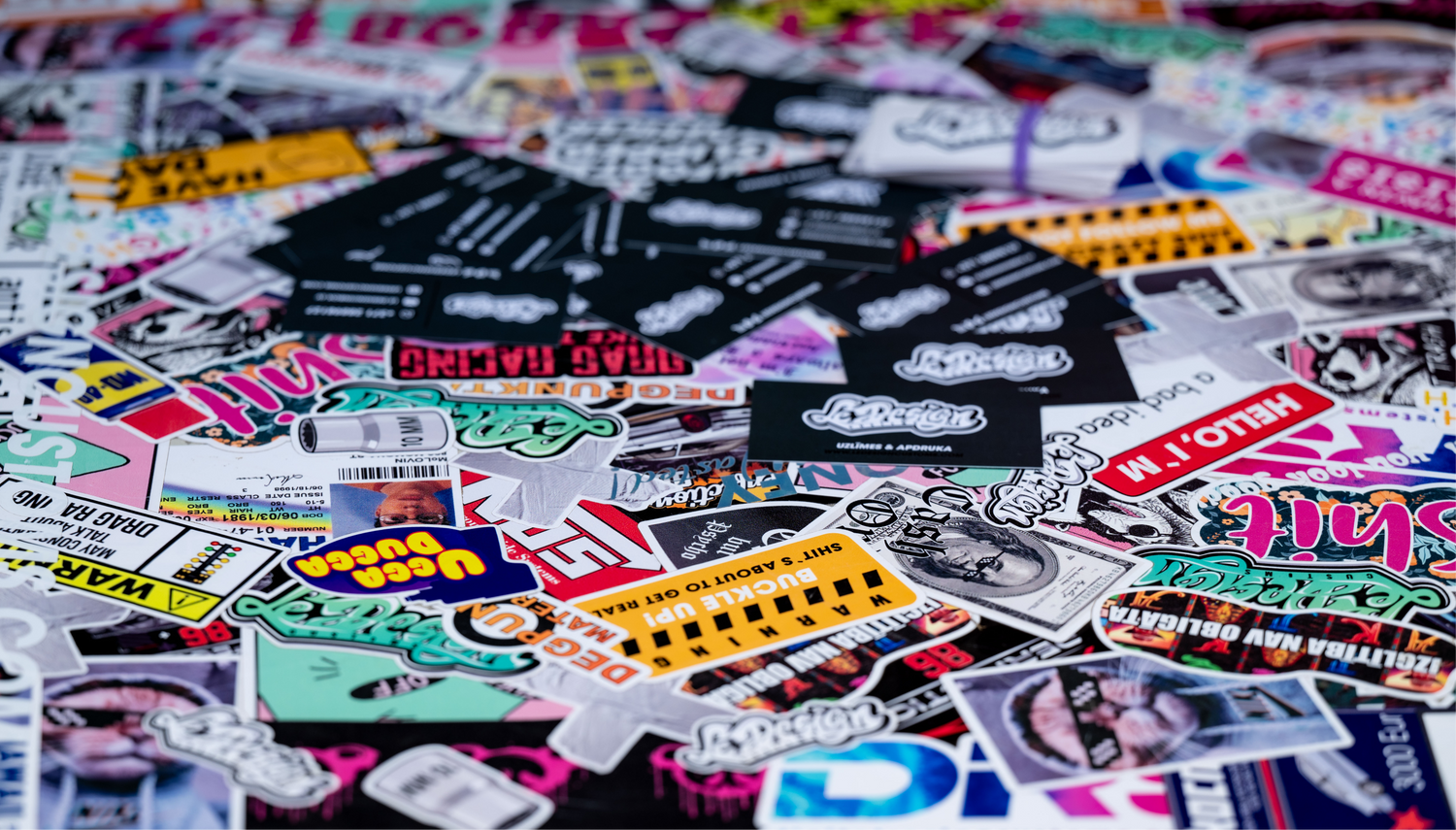 Collection of various colorful stickers on a surface