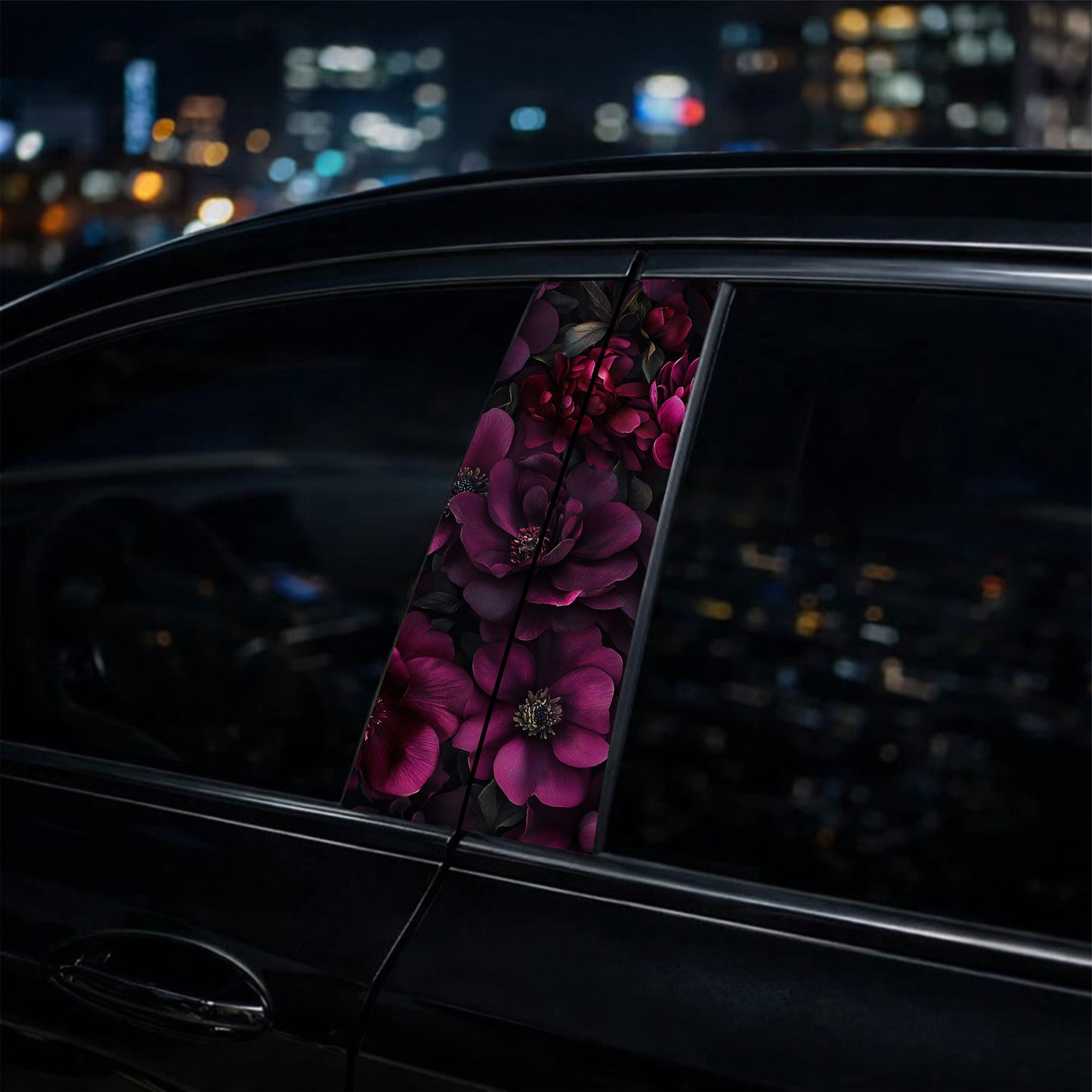 pillar decal  with floral design on a car window at night