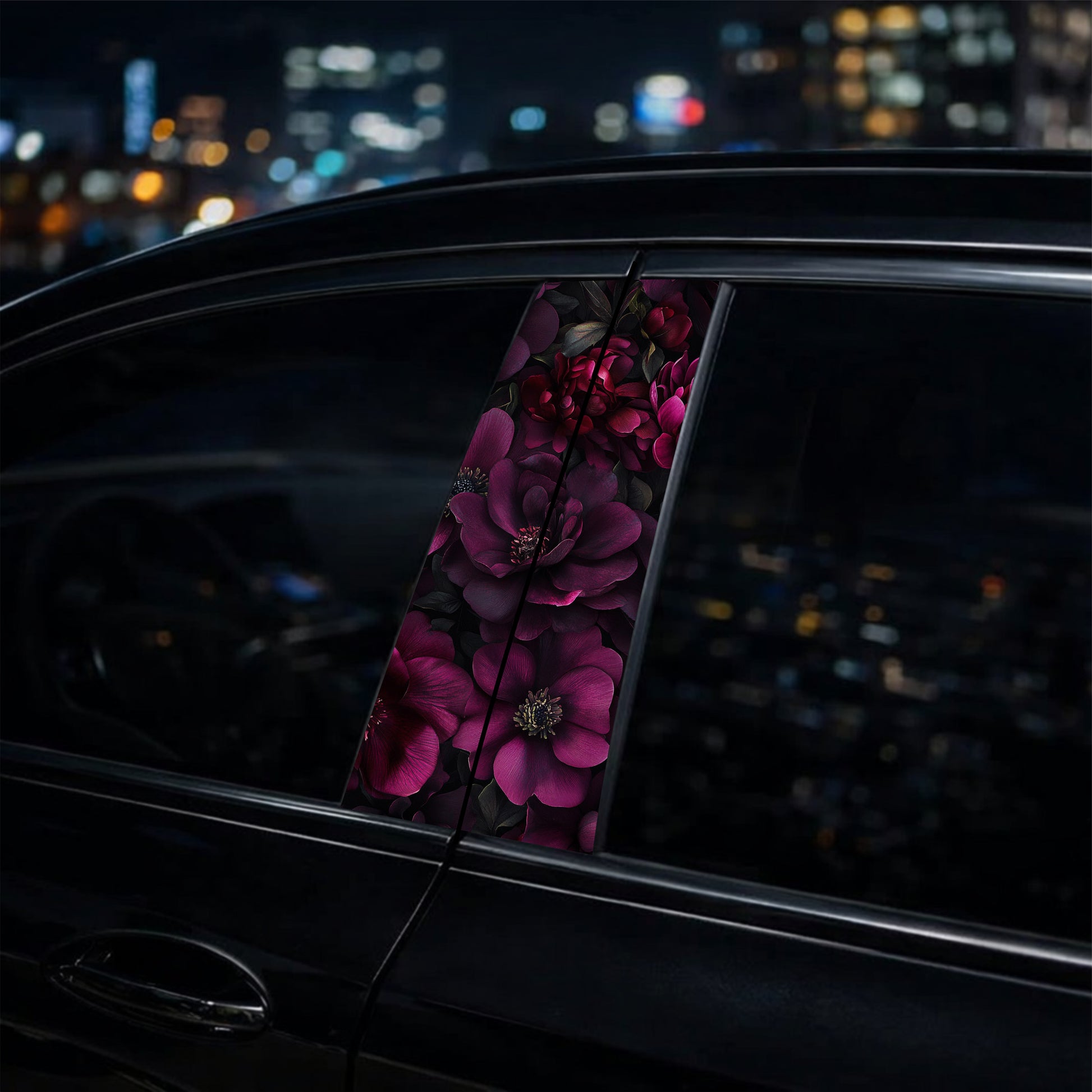 pillar decal  with floral design on a car window at night