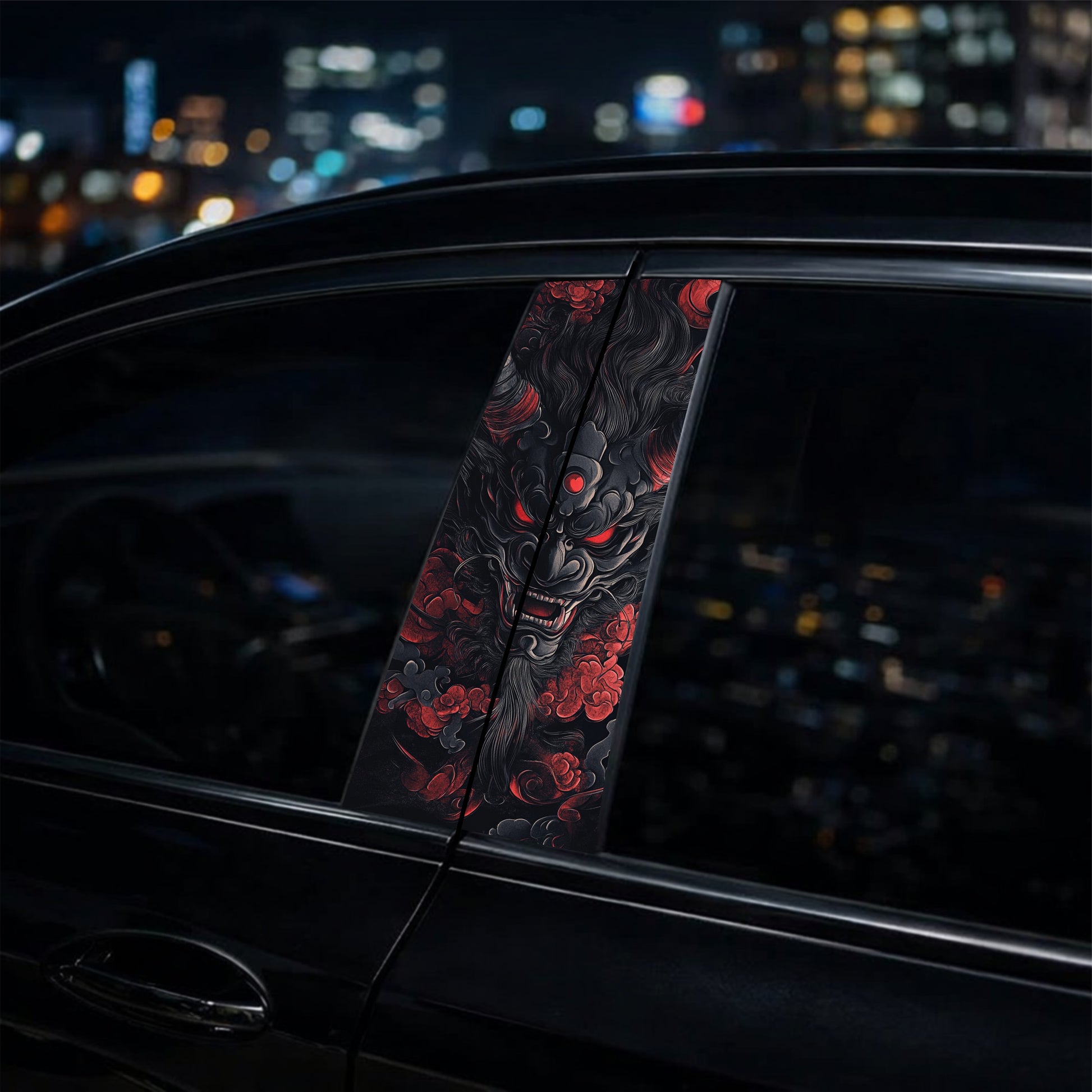Decorative car window shade with dragon design against a cityscape at night