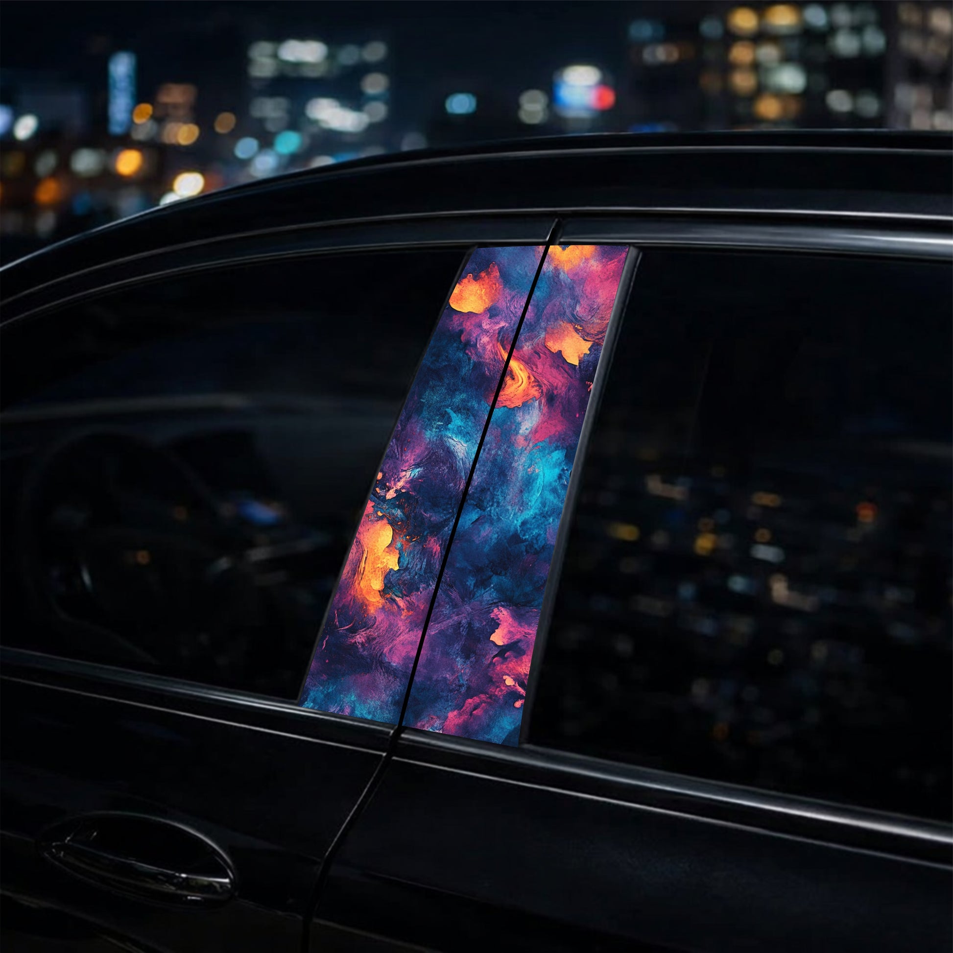 Colorful car window decal with cityscape at night