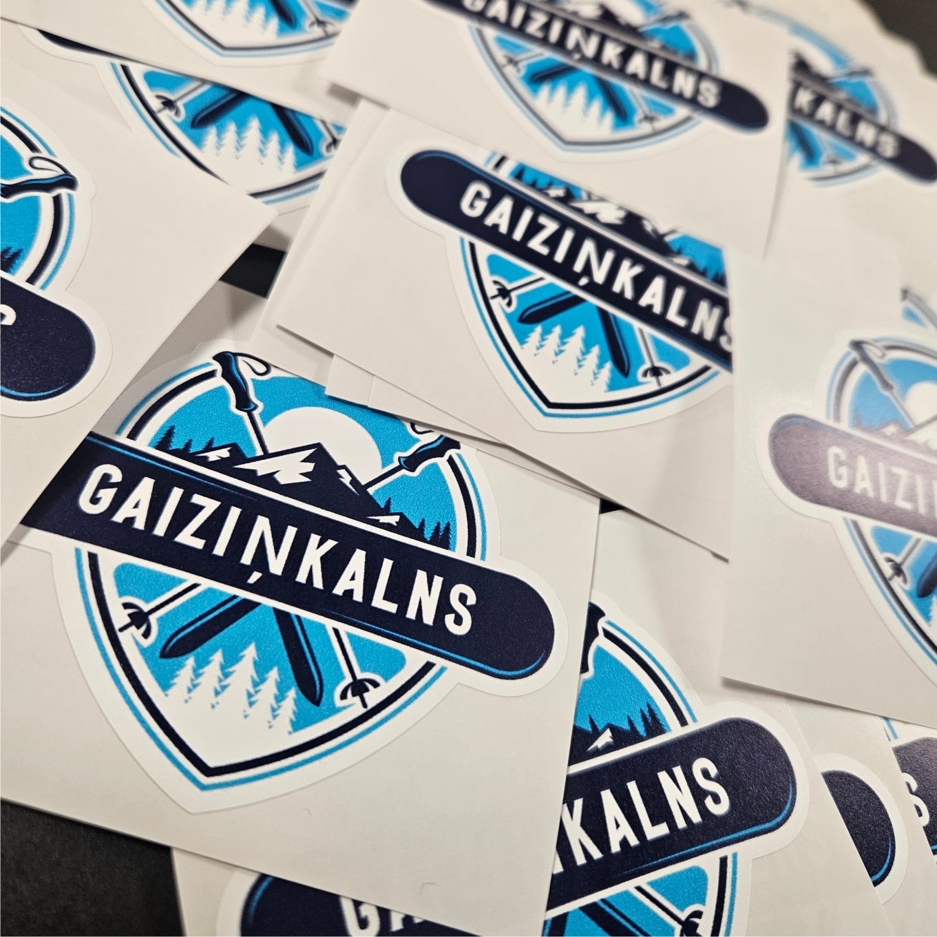 Stickers with 'Gaiziánkalns' design on a white background