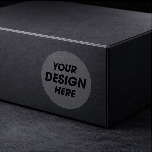 Black box with a round label area for customization on a dark background
